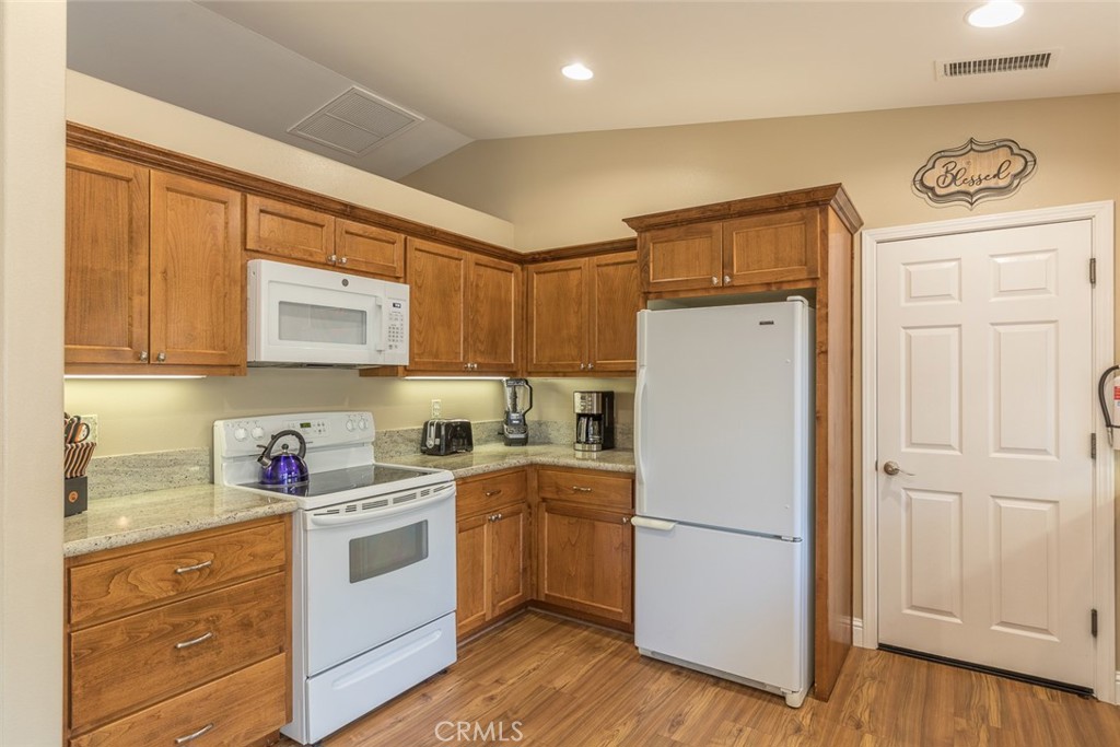 5060-5064 Mykleoaks Road Mariposa, CA 95338 - Photo 53 of 63 a kitchen with a refrigerator sink and cabinets