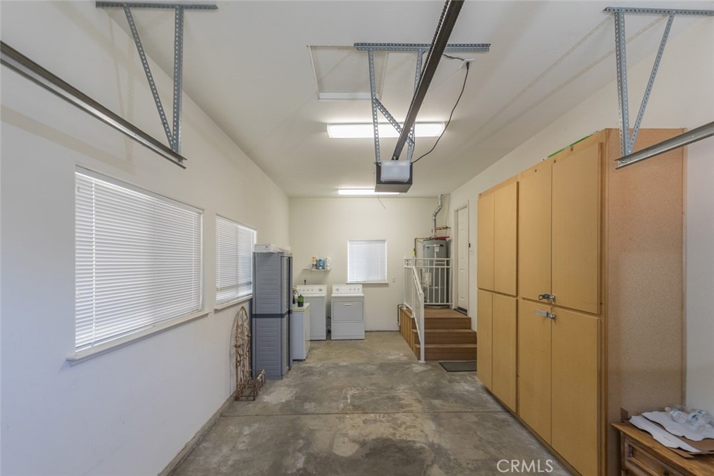 5060-5064 Mykleoaks Road Mariposa, CA 95338 - Photo 61 of 63 a view of a refrigerator in kitchen and an empty room