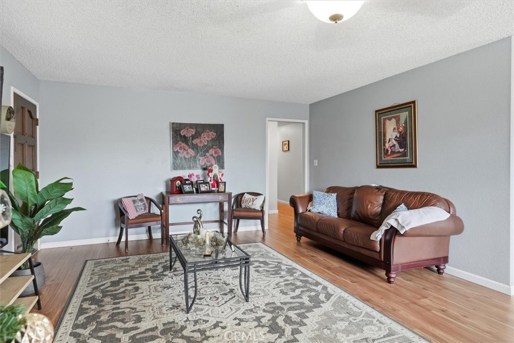 5060-5064 Mykleoaks Road Mariposa, CA 95338 - Photo 10 of 63 a living room with furniture and a potted plant