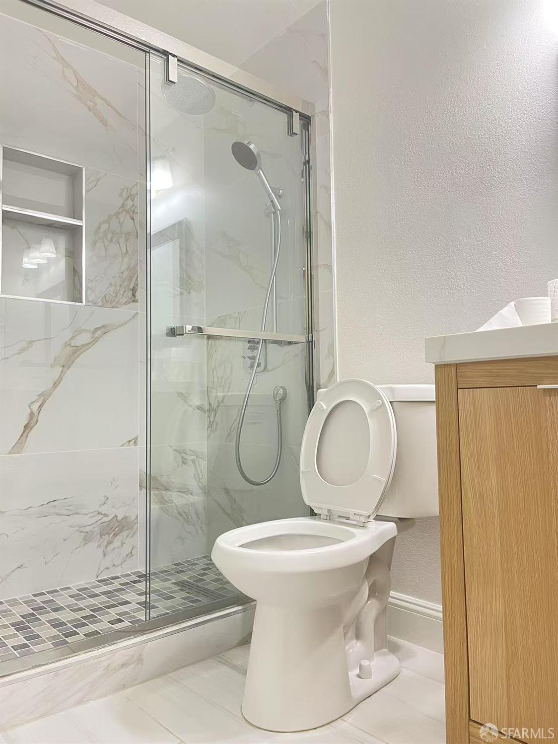 1435 Newcomb Avenue San Francisco, CA 94124 - Photo 8 of 9 a white toilet sitting next to a bathroom sink