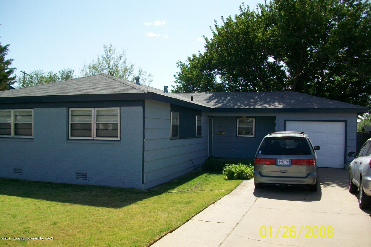 4412 South Bonham Street Amarillo, TX 79110 - Photo 2 of 26 a car parked in front of a house