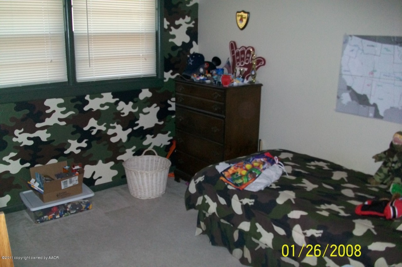 4412 South Bonham Street Amarillo, TX 79110 - Photo 24 of 26 a room with toys and flowers