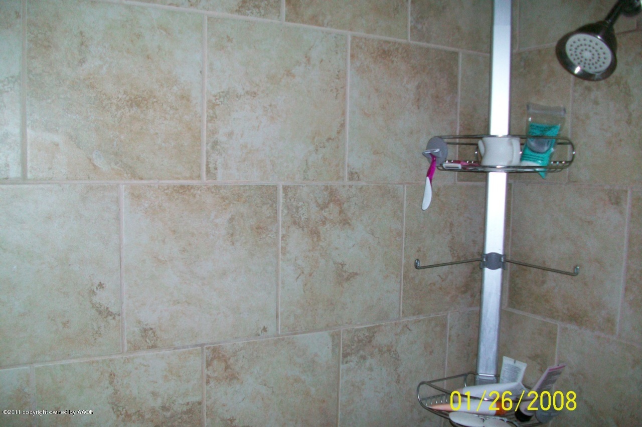 4412 South Bonham Street Amarillo, TX 79110 - Photo 8 of 26 a bathroom with a shower