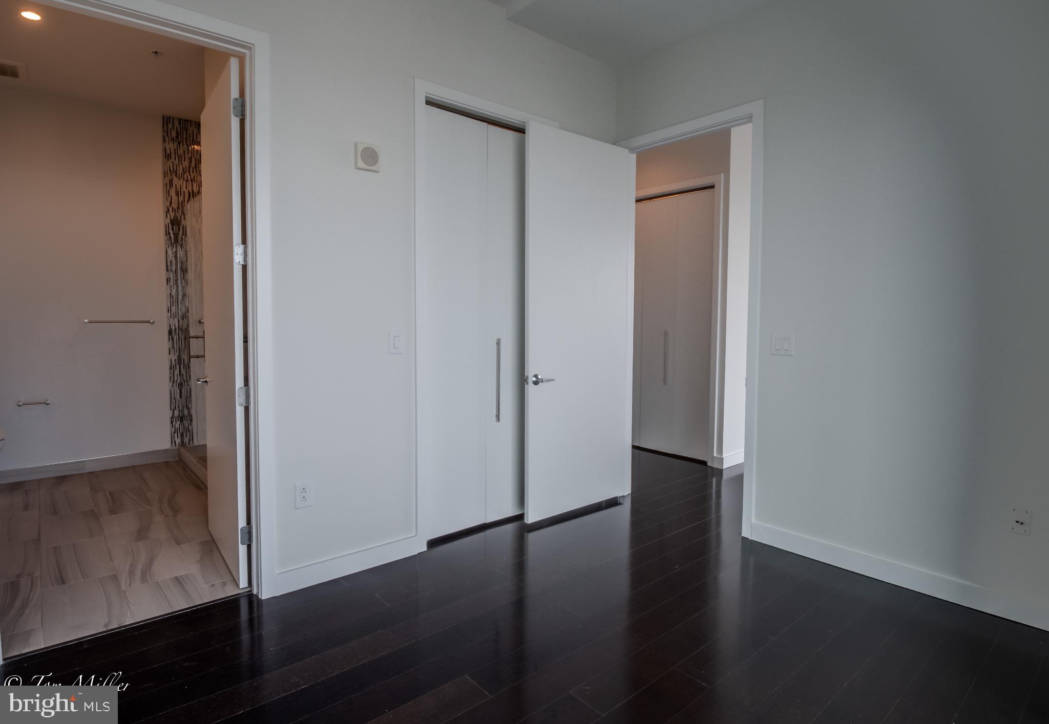 414 Light Street, Unit 4302 Baltimore, MD 21202 - Photo 23 of 42 a view of empty room with wooden floor