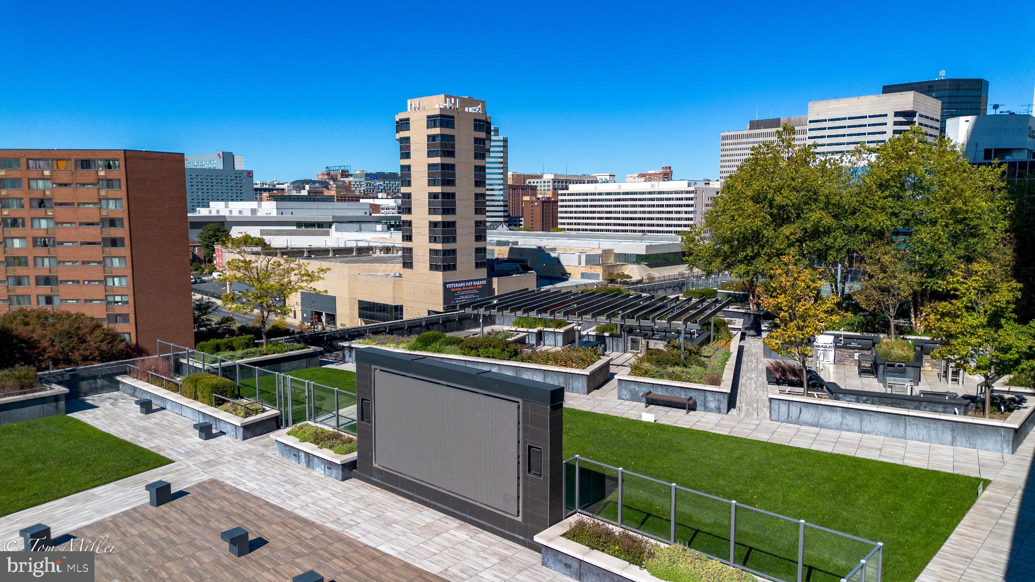 414 Light Street, Unit 4302 Baltimore, MD 21202 - Photo 3 of 42 a view of a chairs and table in the terrace