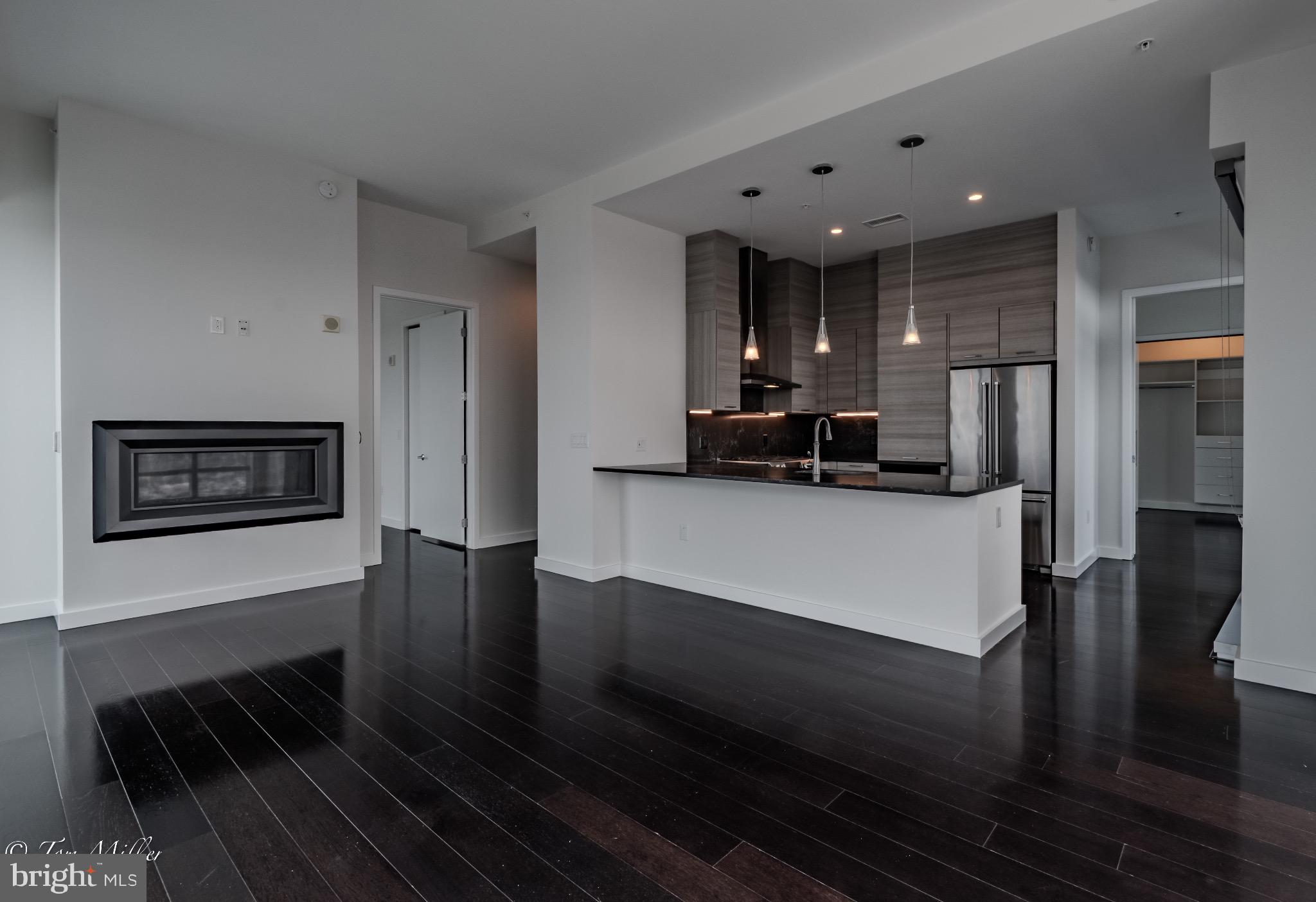 414 Light Street, Unit 4302 Baltimore, MD 21202 - Photo 5 of 42 a view of living room with furniture and flat screen tv