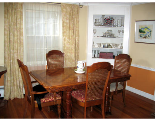 47 Crown Ridge Road Wellesley, MA 02482 - Photo 4 of 11 a view of a dining room with furniture and wooden floor