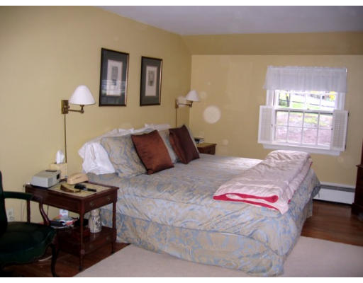 47 Crown Ridge Road Wellesley, MA 02482 - Photo 9 of 11 a bedroom with a bed and a table