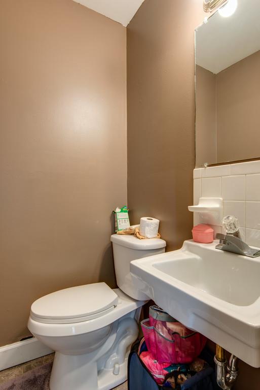 120 Mae Circle Dickson, TN 37055 - Photo 14 of 19 a bathroom with a sink and a toilet