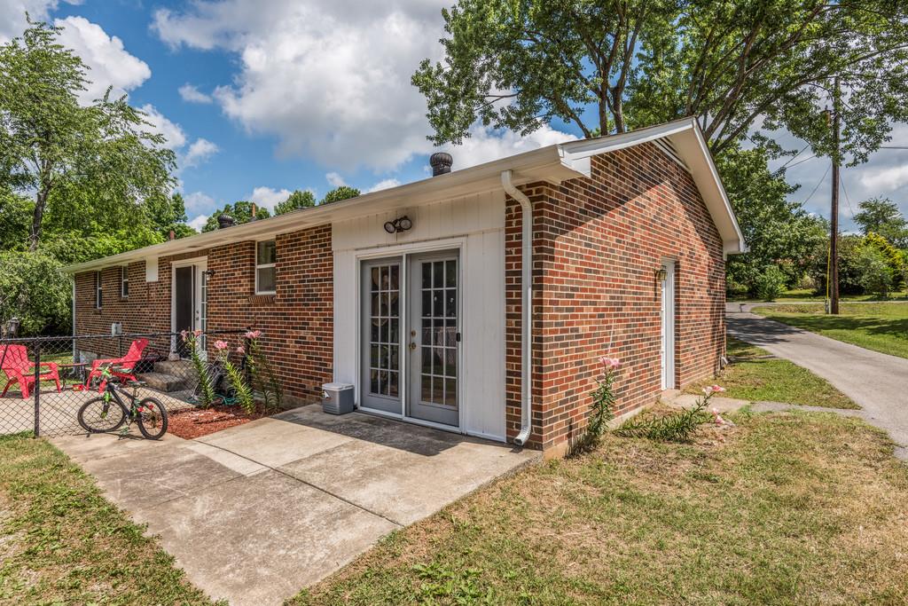 120 Mae Circle Dickson, TN 37055 - Photo 17 of 19 a view of house with backyard space and garden