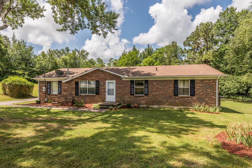 120 Mae Circle Dickson, TN 37055 - Photo 3 of 19 a front view of a house with a yard
