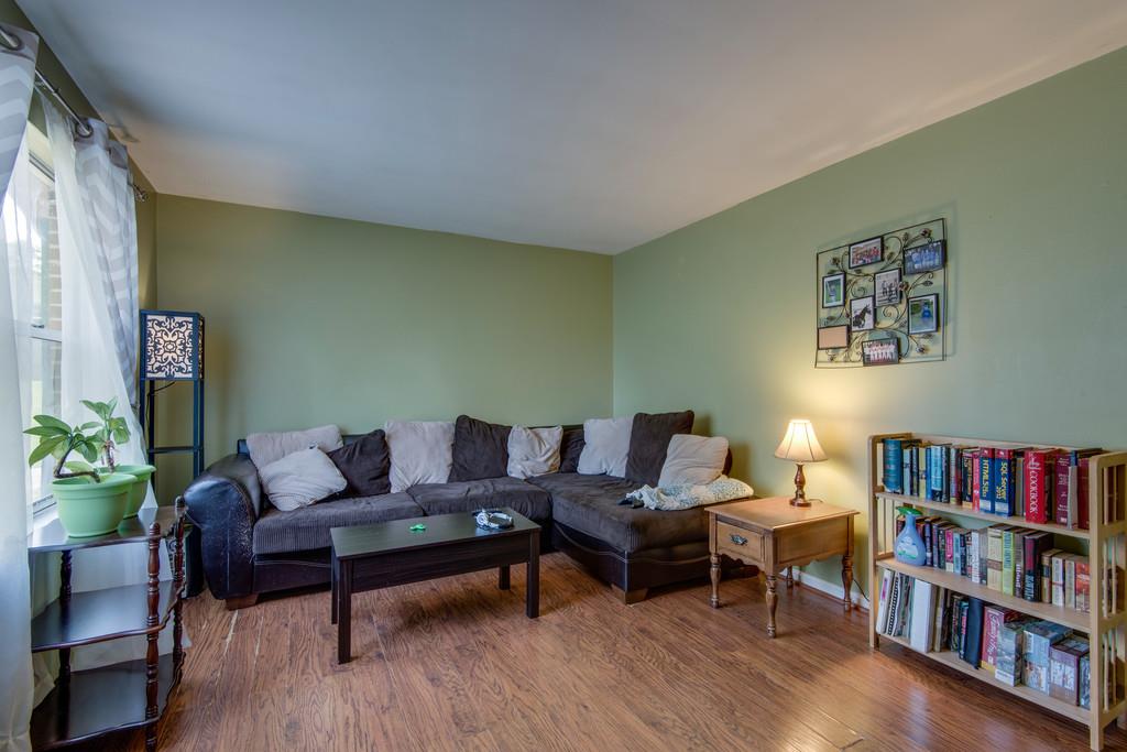 120 Mae Circle Dickson, TN 37055 - Photo 4 of 19 a living room with furniture and a book shelf