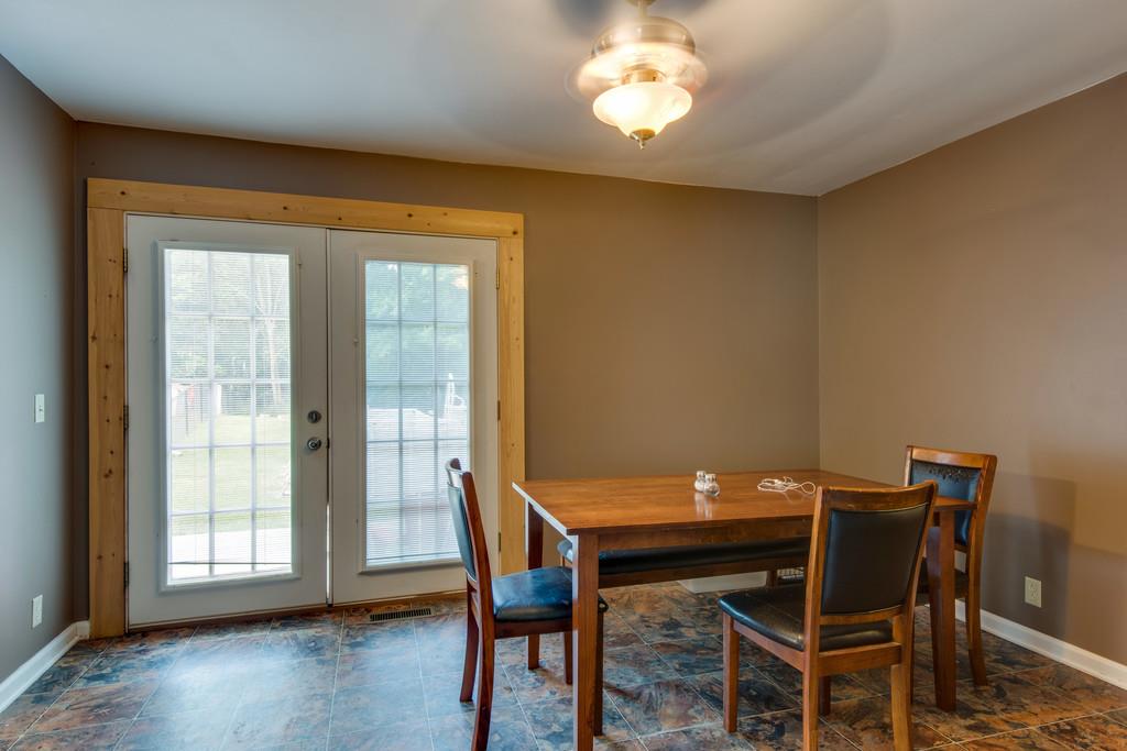 120 Mae Circle Dickson, TN 37055 - Photo 6 of 19 a view of a dining room with furniture and wooden floor