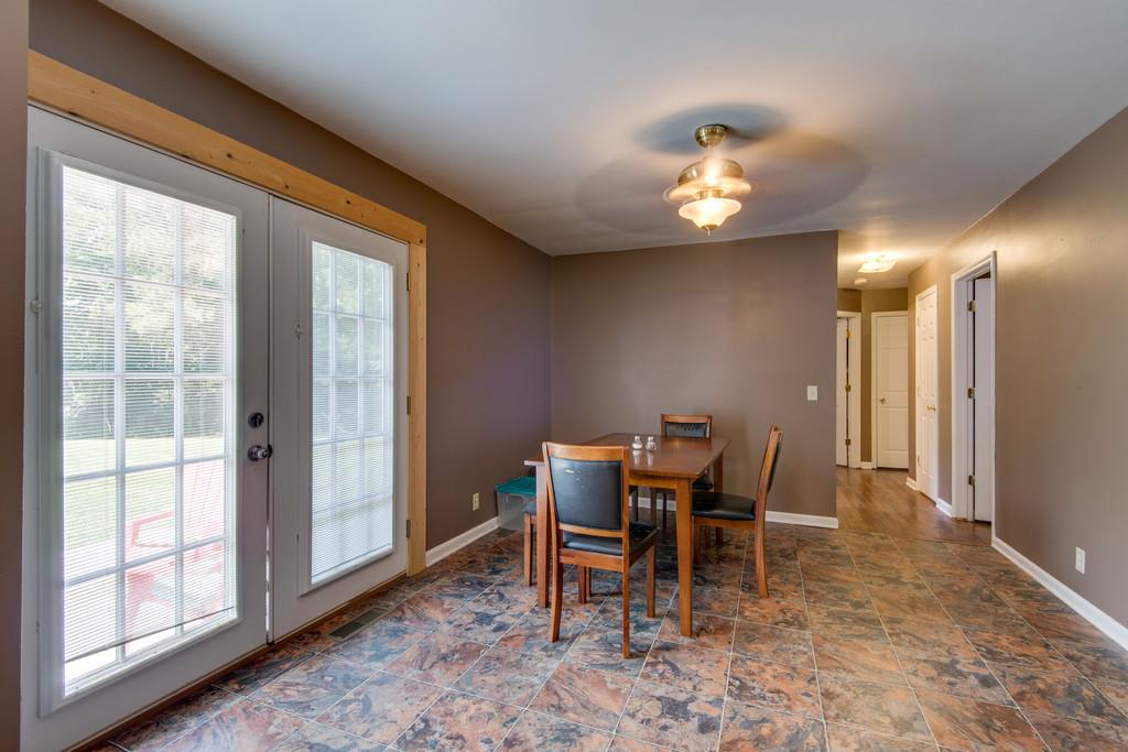 120 Mae Circle Dickson, TN 37055 - Photo 10 of 19 a view of a dining room with furniture and a chandelier