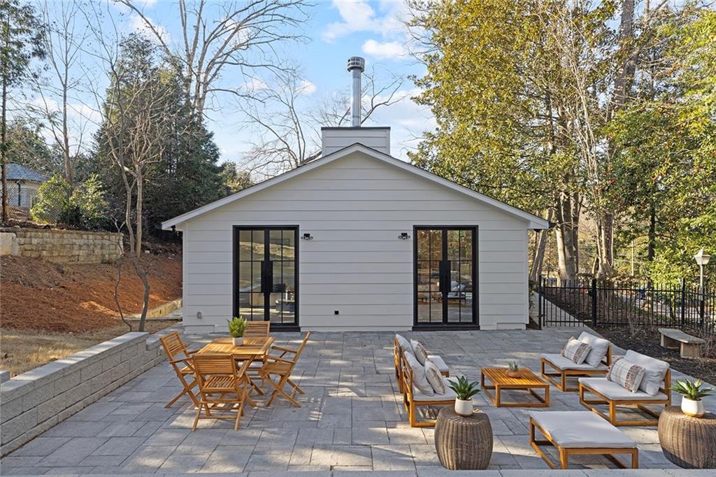 1275 The By Way Northeast Atlanta, GA 30306 - Photo 38 of 48 a backyard of a house with outdoor seating