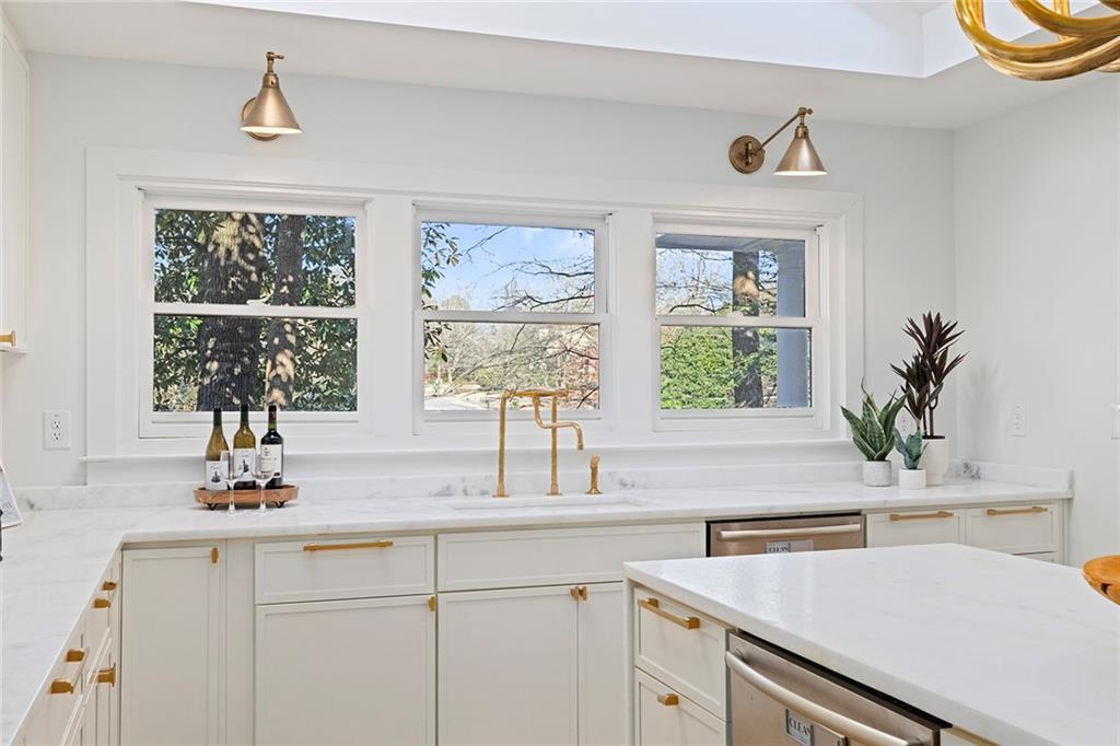 1275 The By Way Northeast Atlanta, GA 30306 - Photo 10 of 48 a kitchen with a sink and a window
