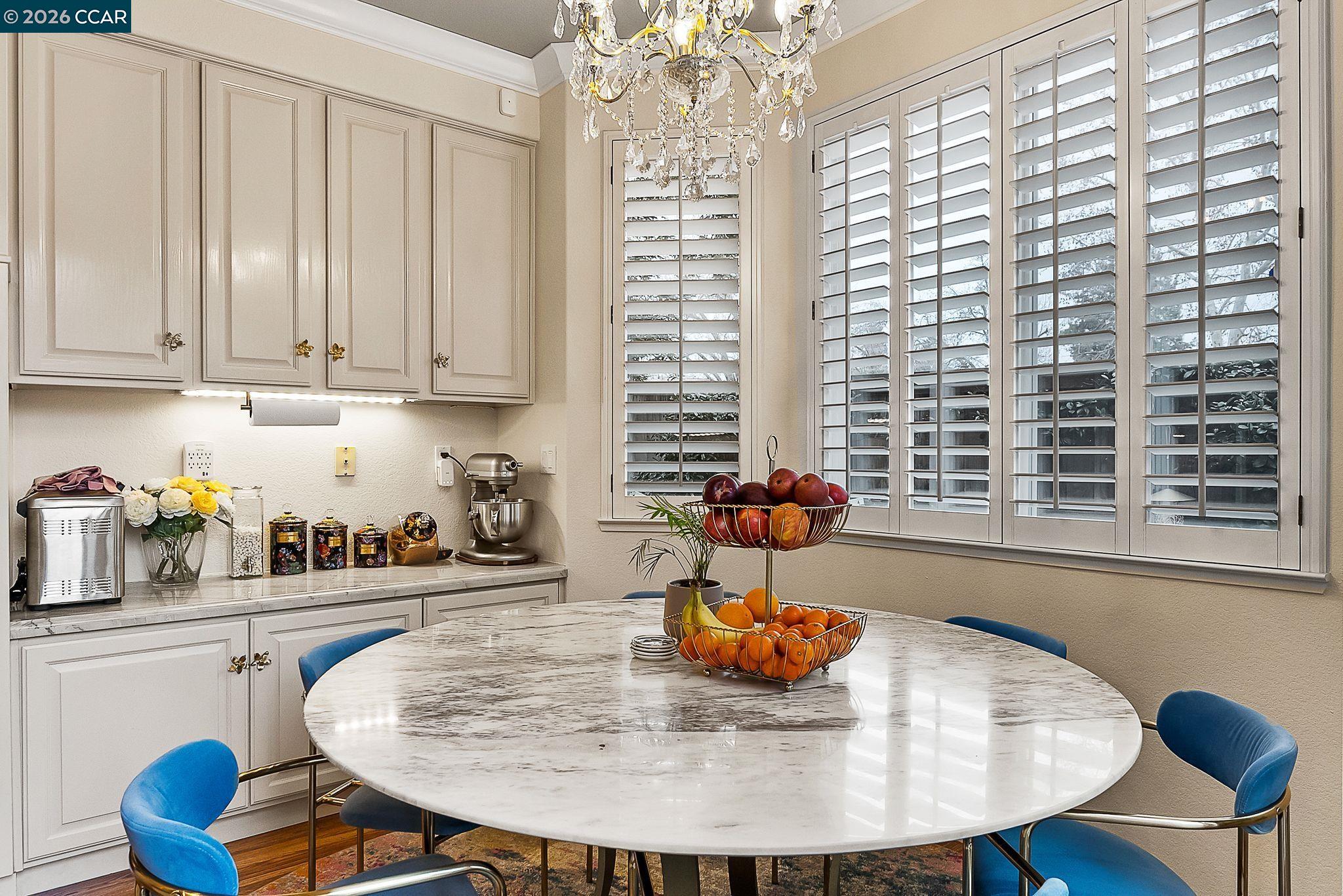 3607 Crystal Tree Court Stockton, CA 95219 - Photo 12 of 44 a view of a dining room with furniture and window