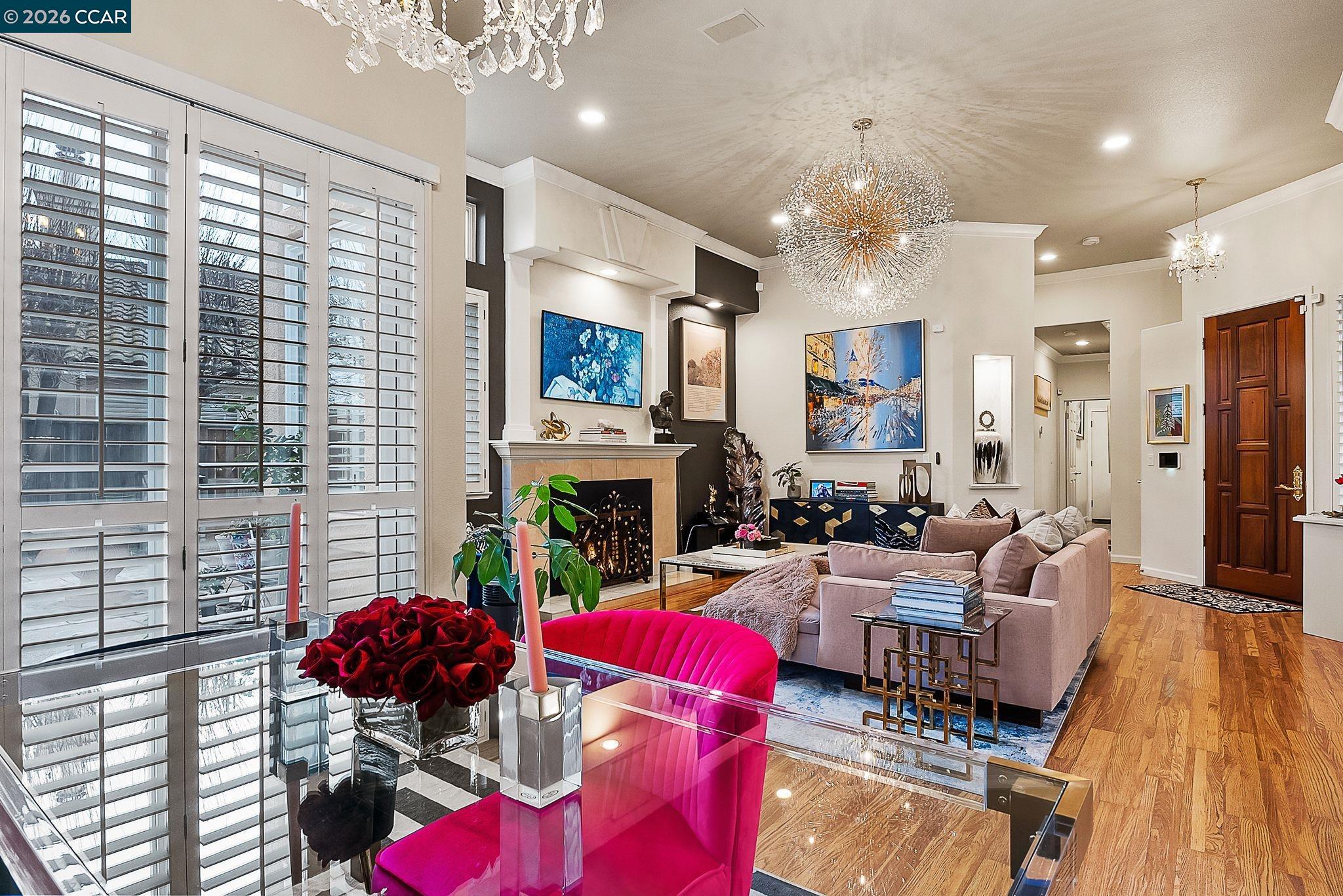 3607 Crystal Tree Court Stockton, CA 95219 - Photo 15 of 44 a living room with furniture fireplace and a large window