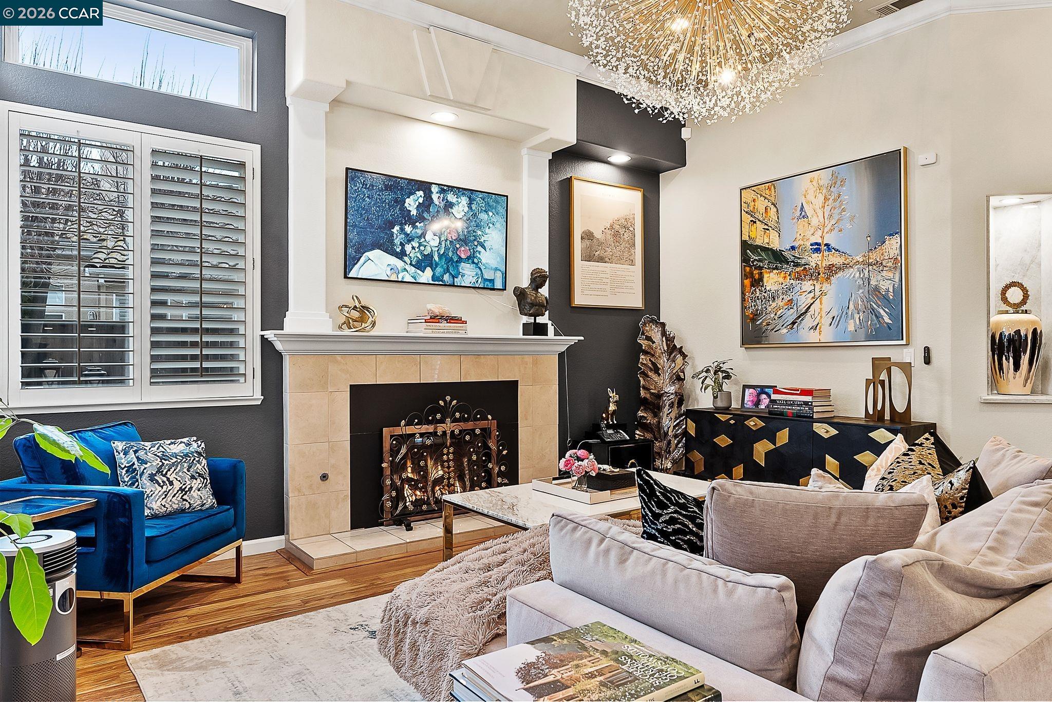3607 Crystal Tree Court Stockton, CA 95219 - Photo 19 of 44 a living room with furniture and a fireplace