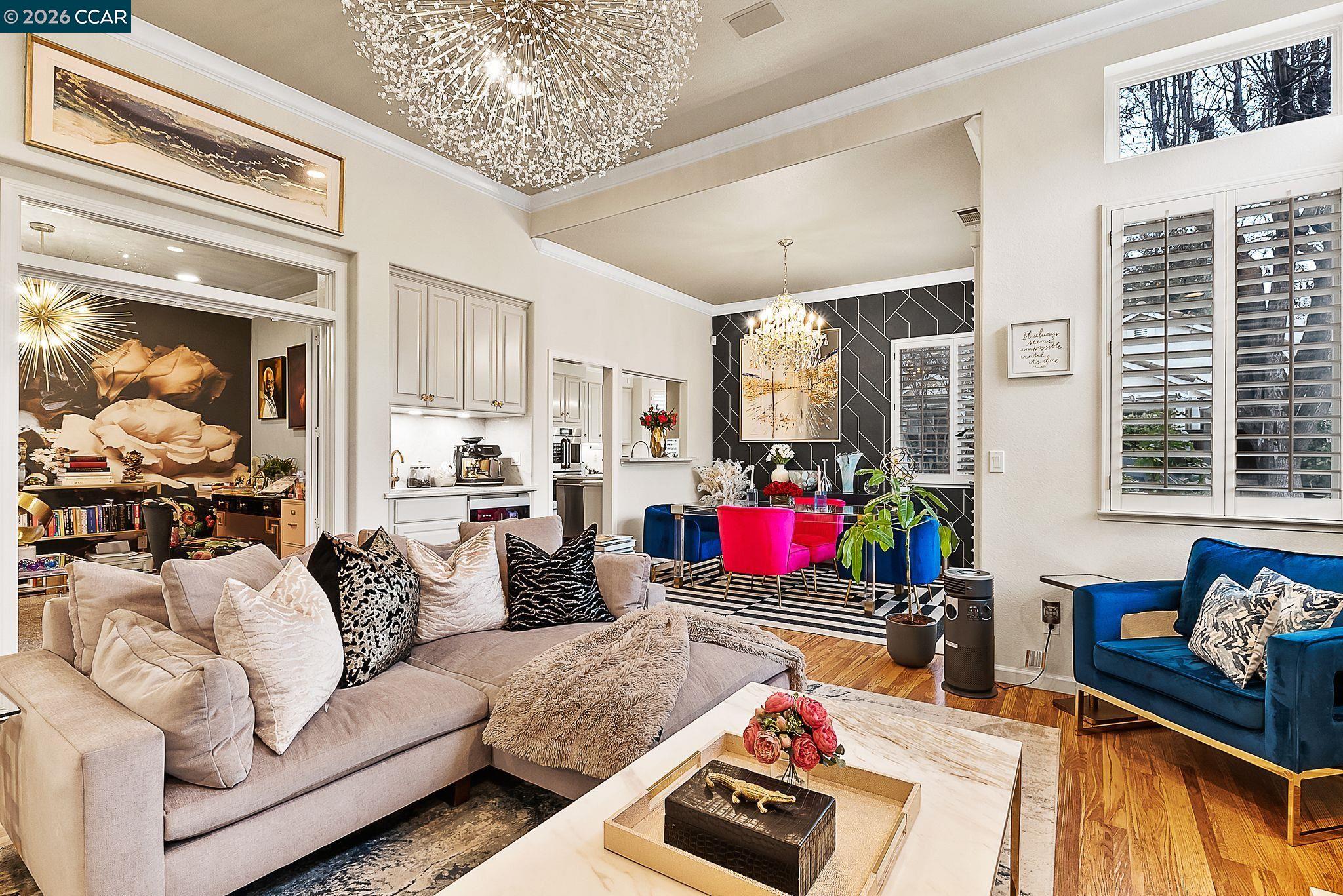 3607 Crystal Tree Court Stockton, CA 95219 - Photo 21 of 44 a living room with furniture and a large window