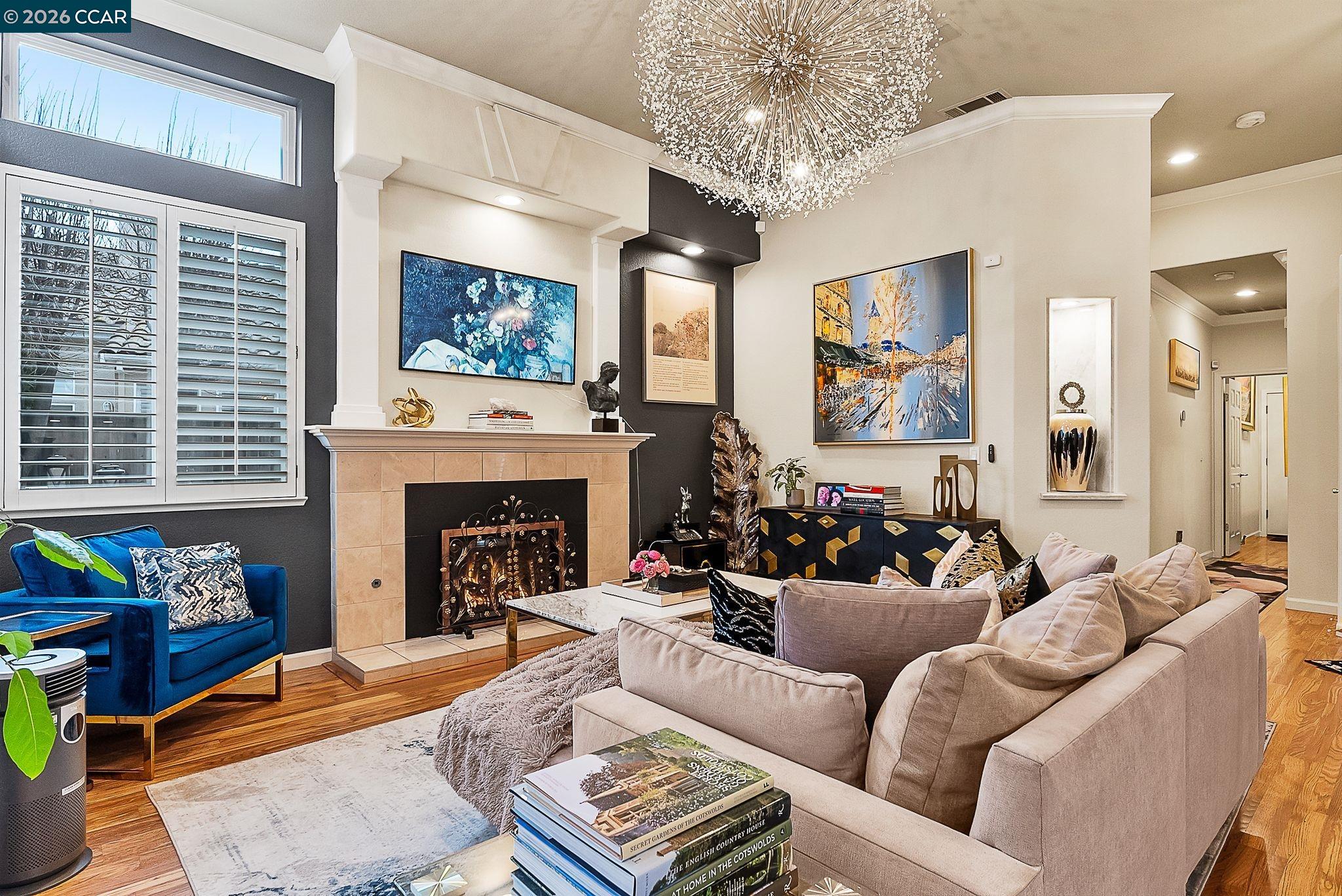 3607 Crystal Tree Court Stockton, CA 95219 - Photo 22 of 44 a living room with furniture and a fireplace