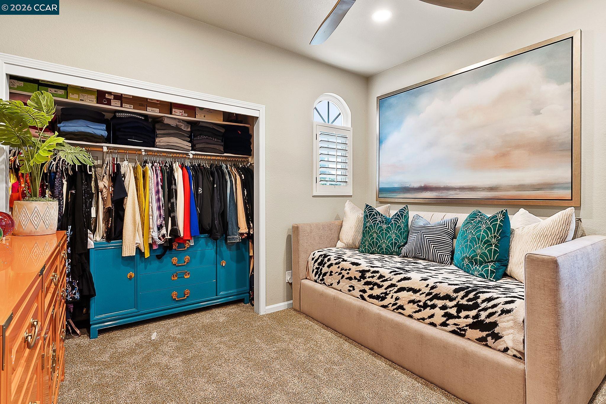 3607 Crystal Tree Court Stockton, CA 95219 - Photo 28 of 44 a bedroom with a bed and a painting on the wall