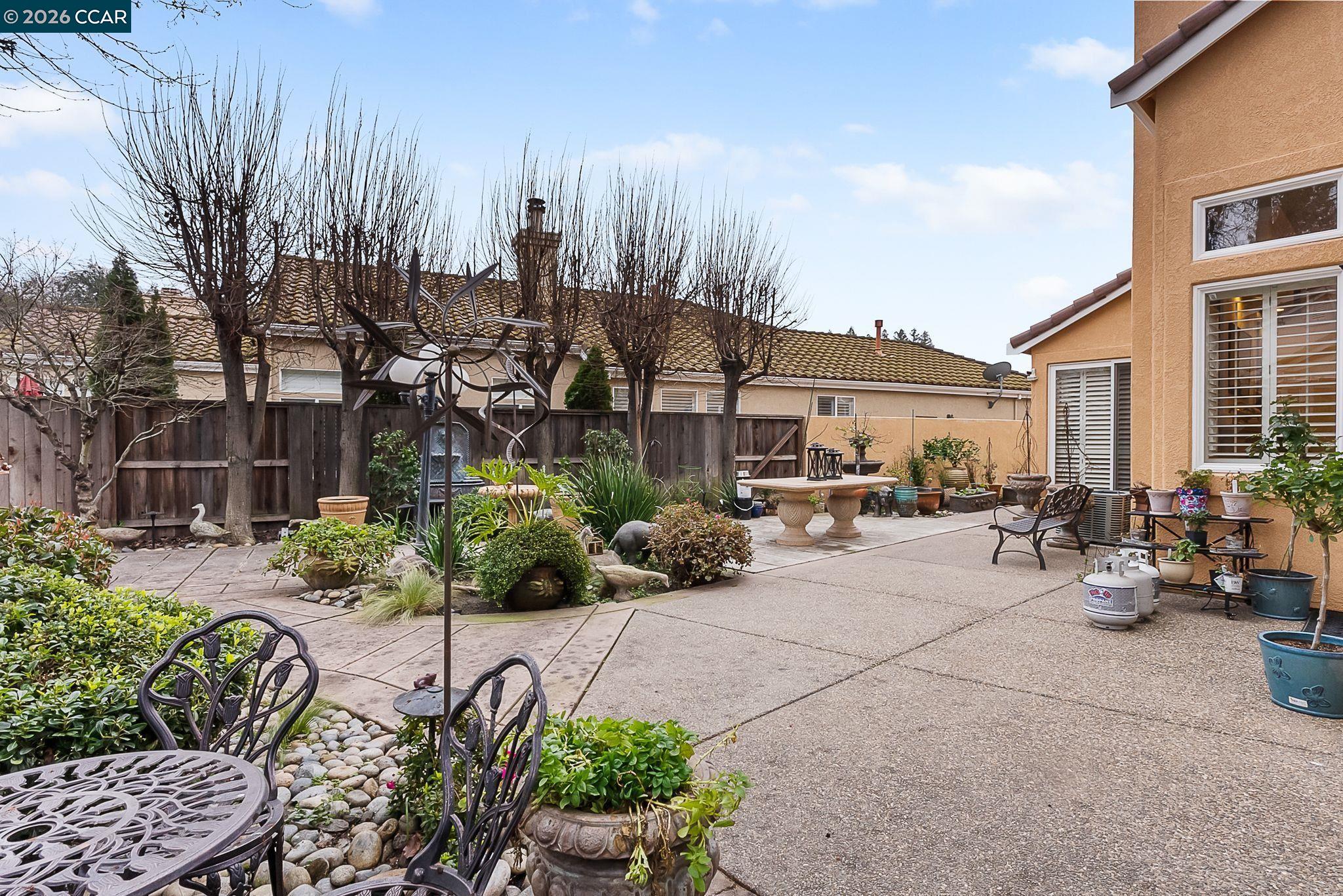 3607 Crystal Tree Court Stockton, CA 95219 - Photo 37 of 44 a view of a patio with couches and potted plants