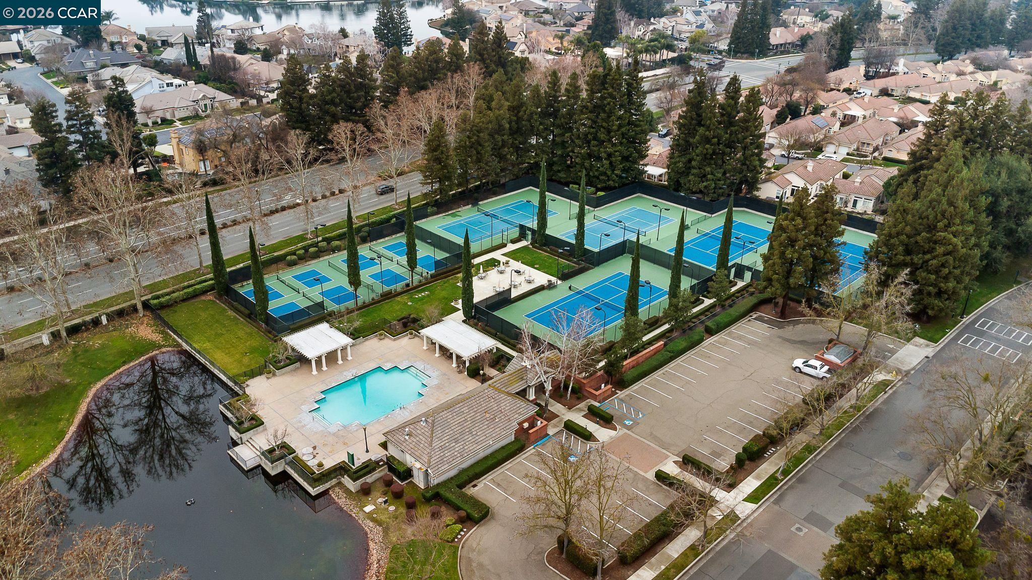 3607 Crystal Tree Court Stockton, CA 95219 - Photo 43 of 44 an aerial view of a house with a swimming pool