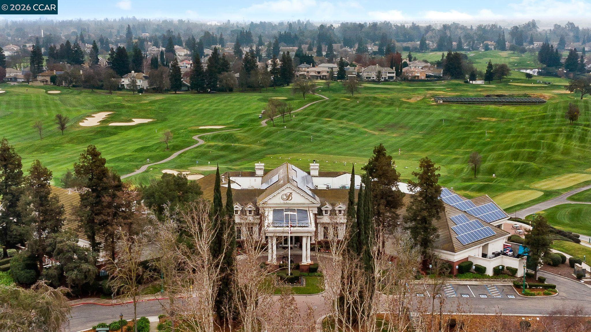 3607 Crystal Tree Court Stockton, CA 95219 - Photo 44 of 44 a view of a house with a big yard and large trees