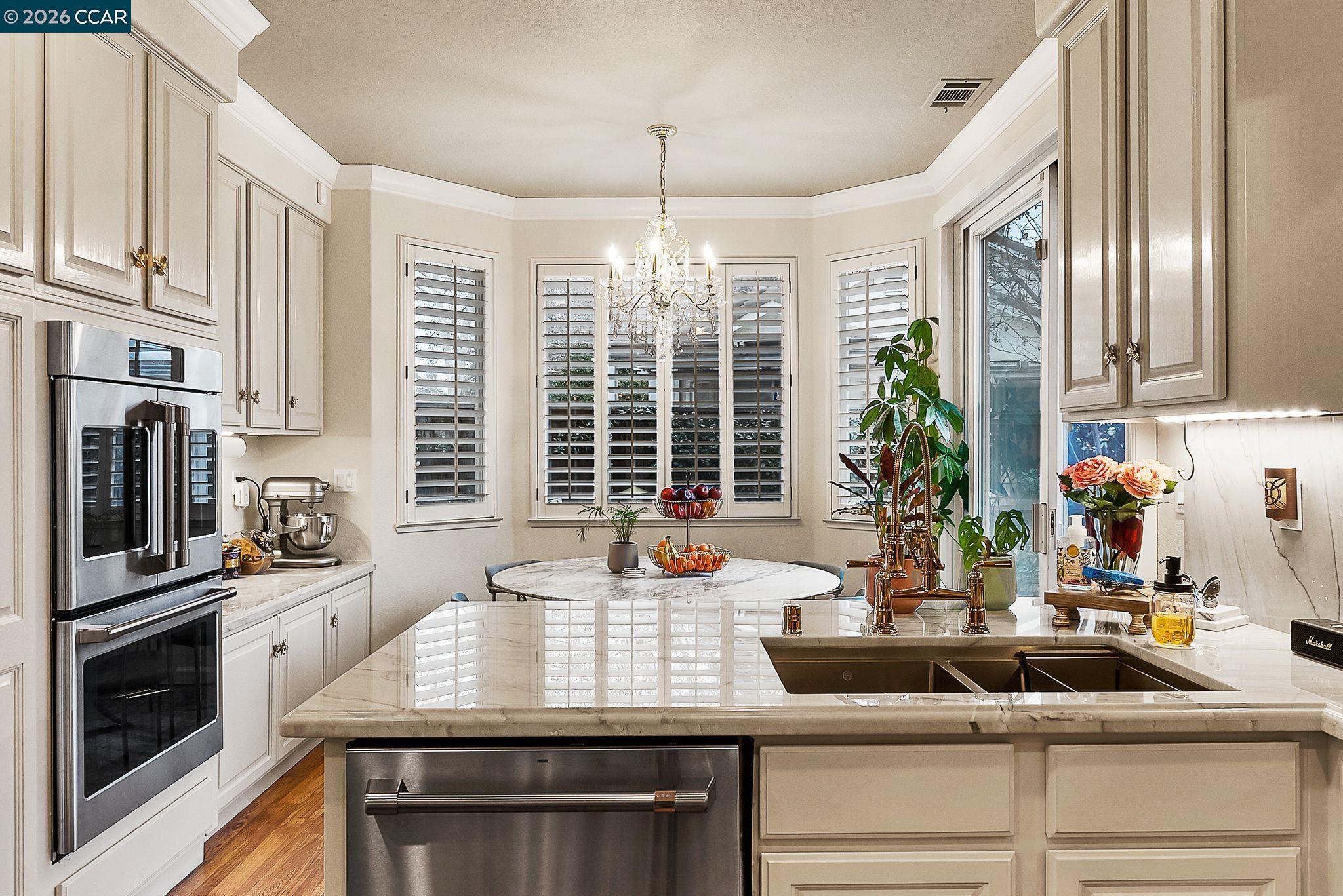 3607 Crystal Tree Court Stockton, CA 95219 - Photo 6 of 44 a kitchen with stove and cabinets