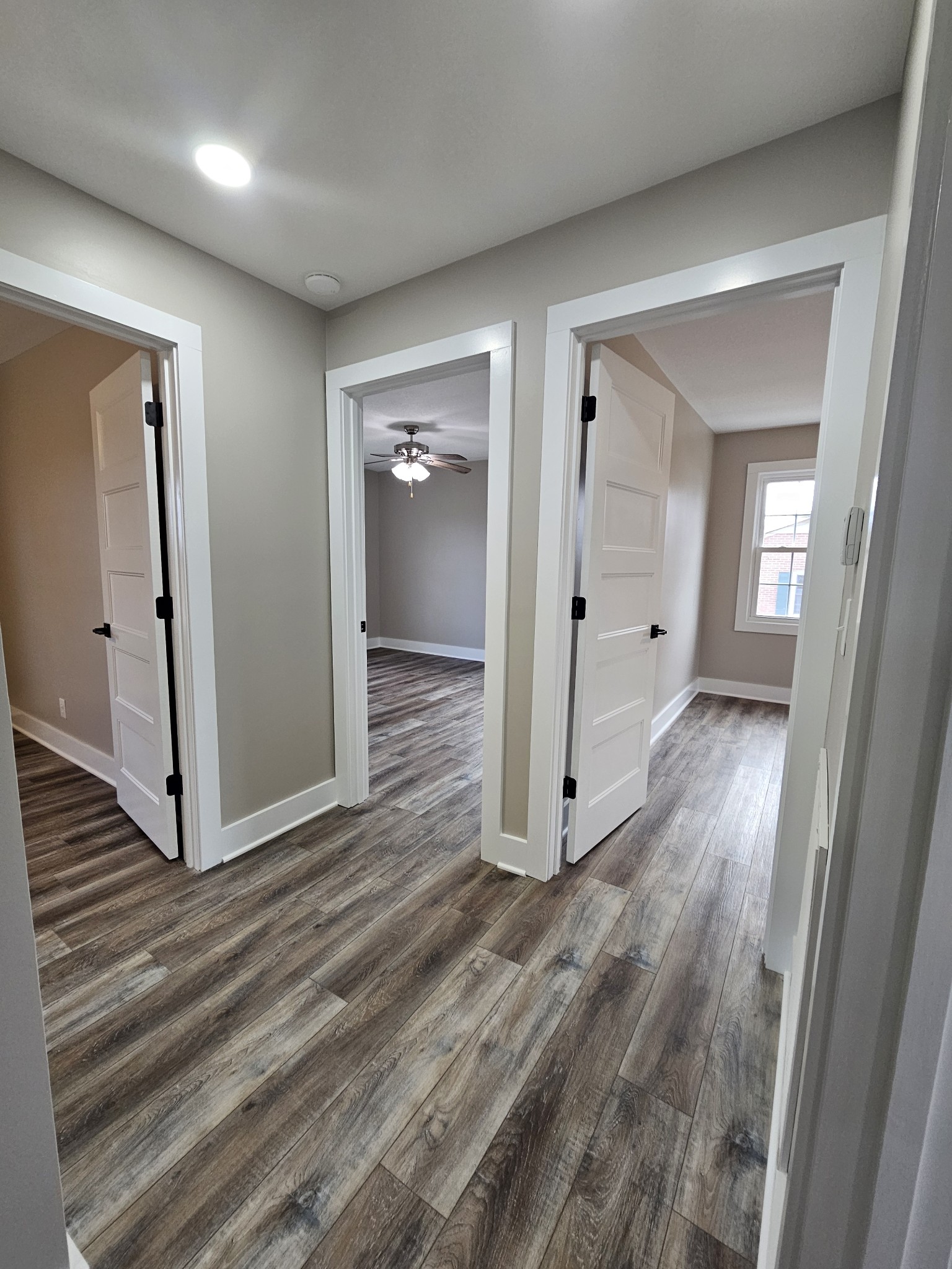 742 Laws Road McMinnville, TN 37110 - Photo 17 of 25 an empty room with wooden floor and entrance