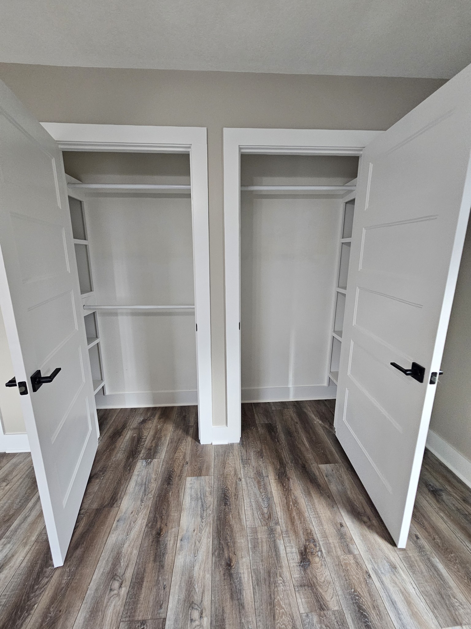 742 Laws Road McMinnville, TN 37110 - Photo 21 of 25 an empty room with wooden floor and entrance