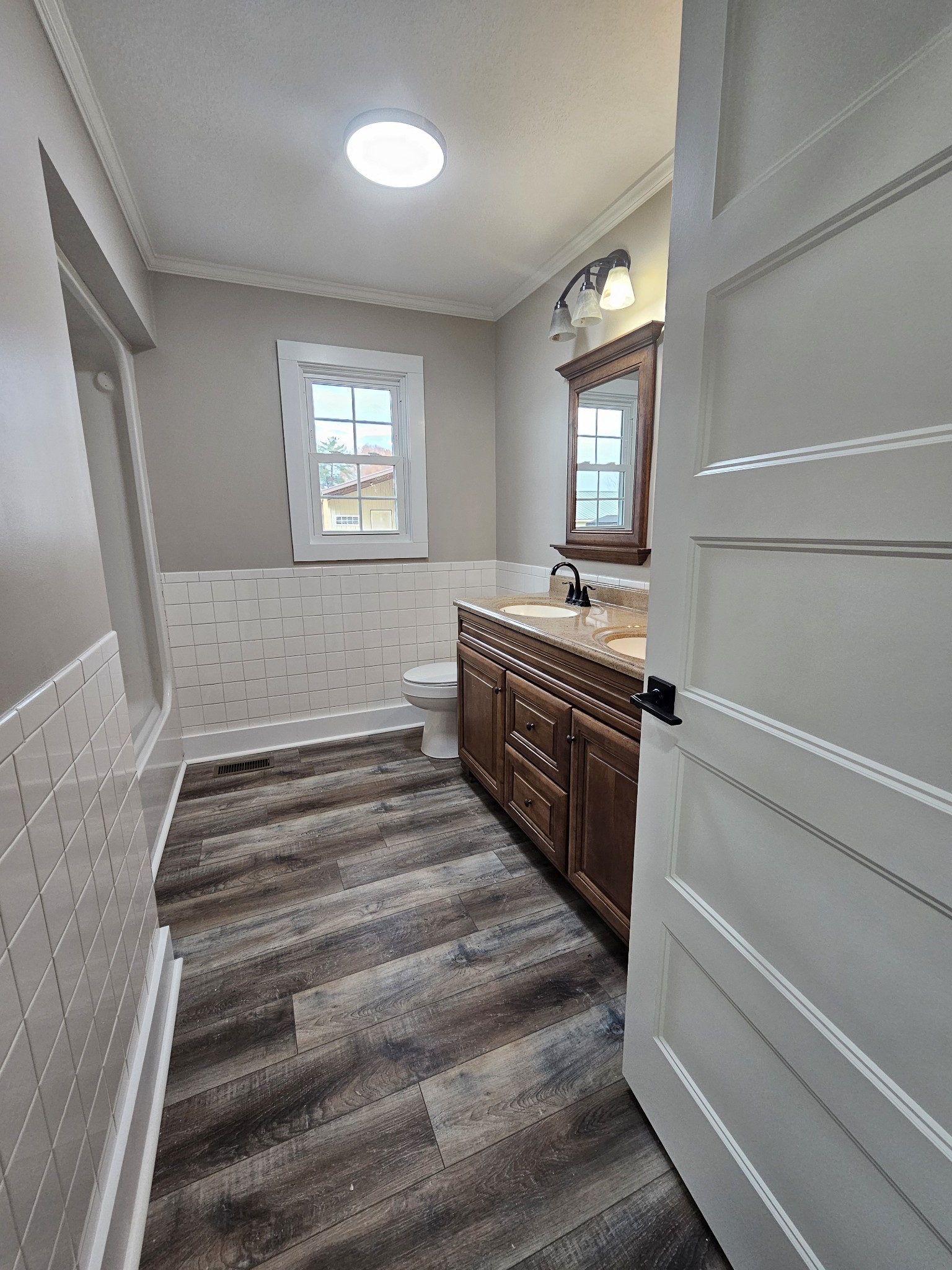 742 Laws Road McMinnville, TN 37110 - Photo 22 of 25 a spacious bathroom with a bathtub and sink