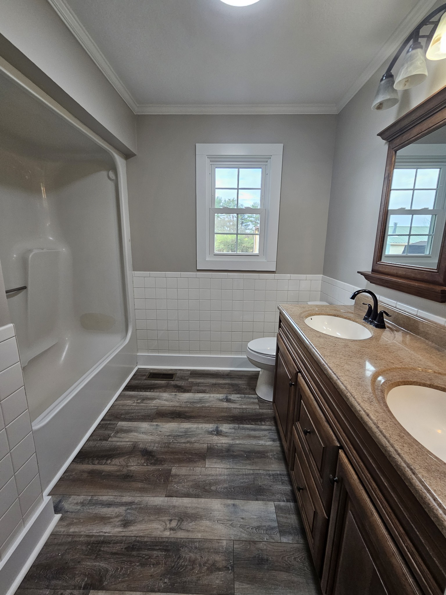 742 Laws Road McMinnville, TN 37110 - Photo 23 of 25 a bathroom with a sink and a bathtub