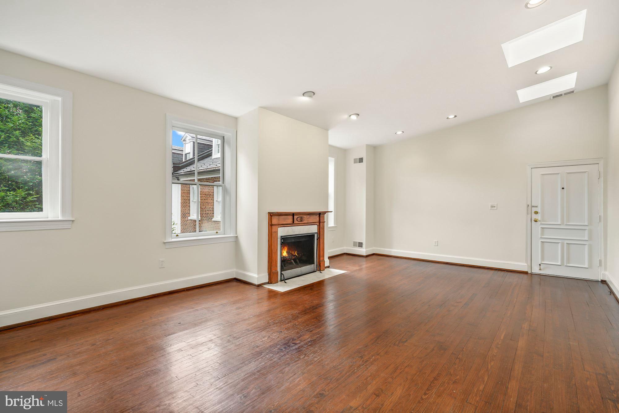 3333 N Street Northwest, Unit 7 Washington, DC 20007 - Photo 3 of 31 Living Room with wood-burning fireplace