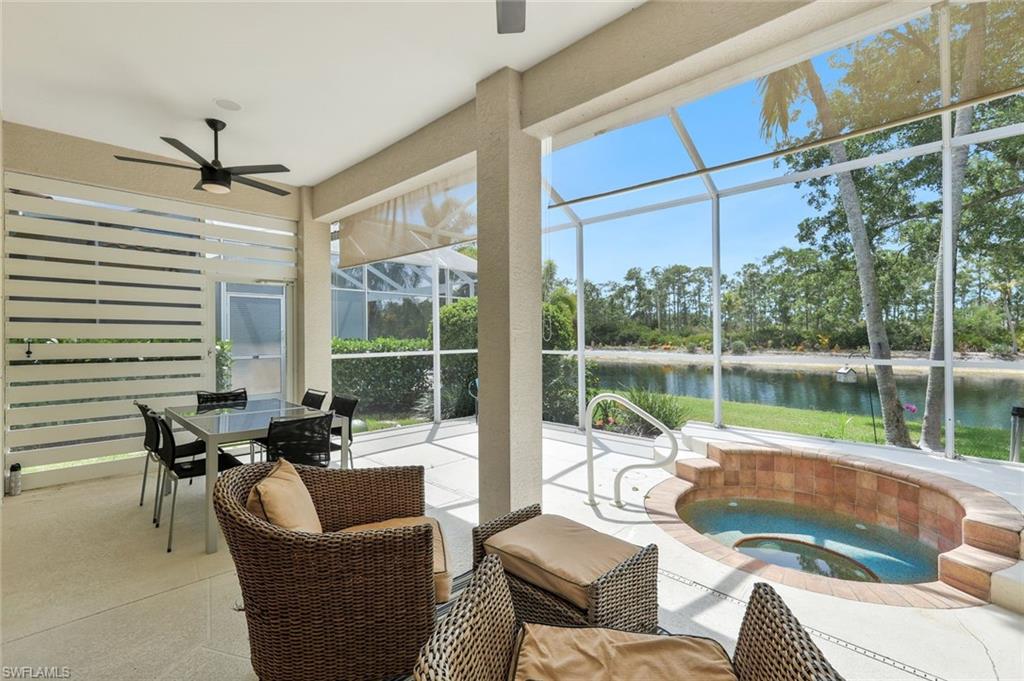 5717 Lago Villaggio Way Naples, FL 34104 - Photo 29 of 35 a outdoor space with patio the couches and pool