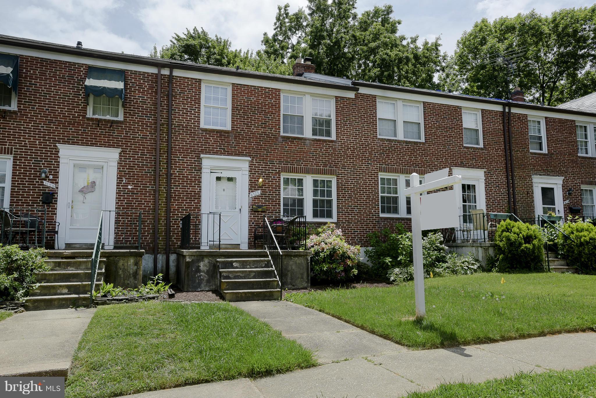 6125 Regent Park Road Catonsville, MD 21228 - Photo 1 of 25 a view of a house with backyard and garden