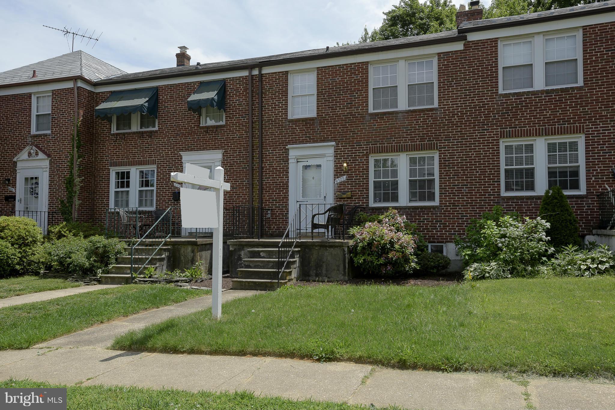 6125 Regent Park Road Catonsville, MD 21228 - Photo 2 of 25 a front view of a house with garden