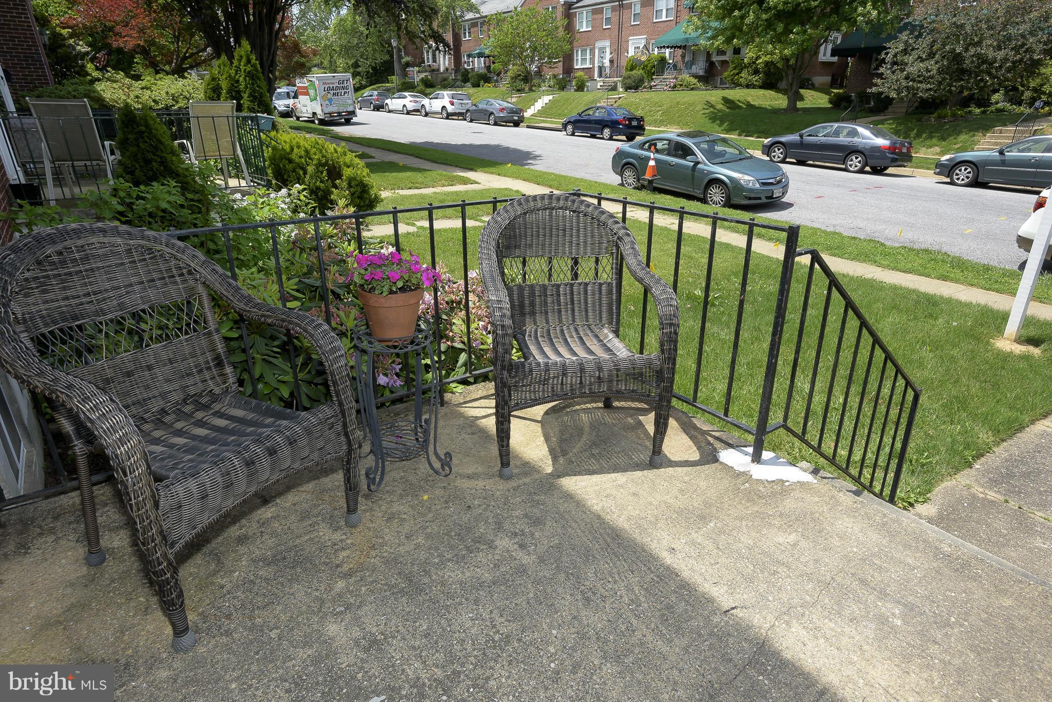 6125 Regent Park Road Catonsville, MD 21228 - Photo 3 of 25 a view of a patio with a table chairs and a patio