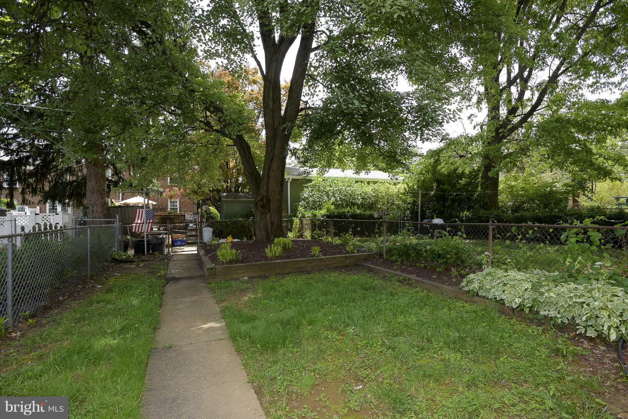 6125 Regent Park Road Catonsville, MD 21228 - Photo 22 of 25 a view of a garden with plants