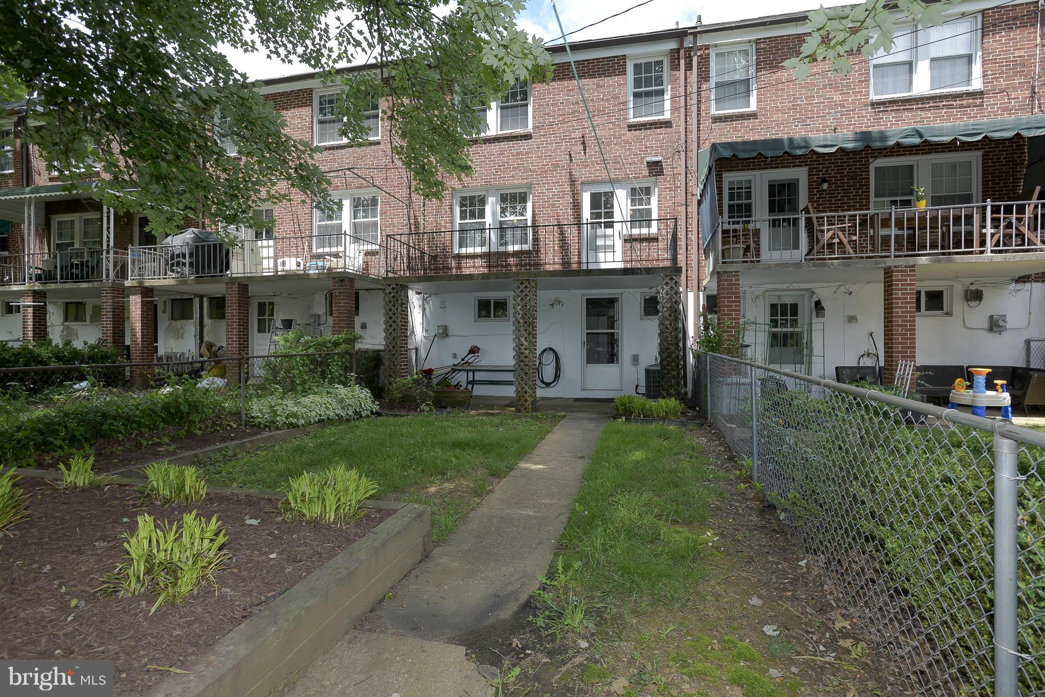 6125 Regent Park Road Catonsville, MD 21228 - Photo 23 of 25 a front view of a house with garden