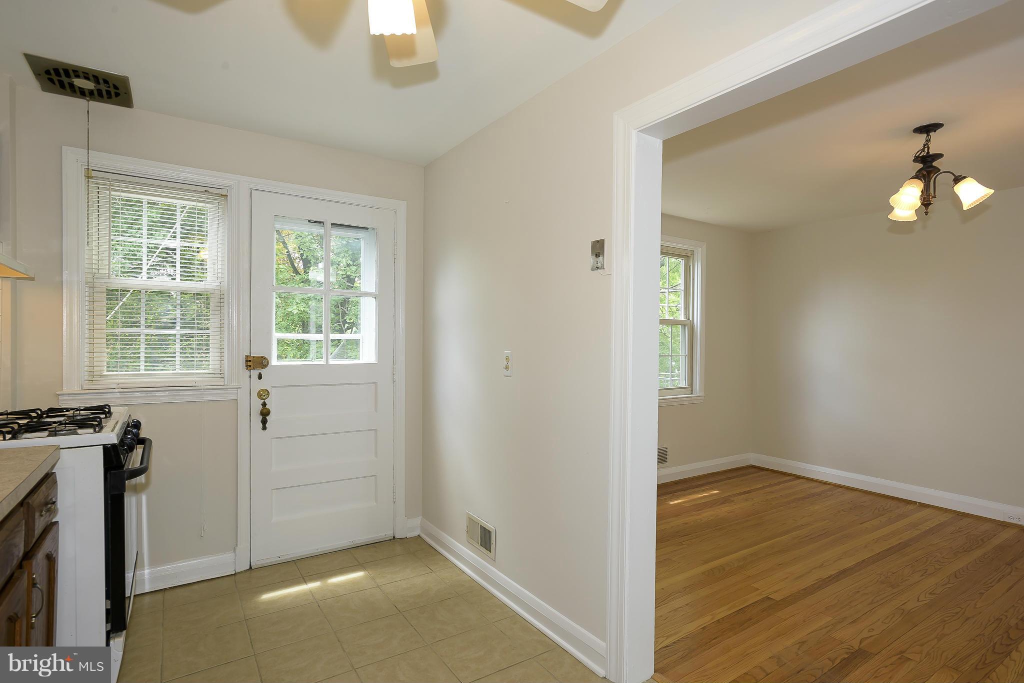6125 Regent Park Road Catonsville, MD 21228 - Photo 8 of 25 an entryway view with wooden floor and windows