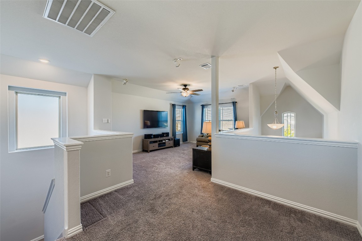 1075 Cherrystone Loop Buda, TX 78610 - Photo 23 of 28 a view of a living room hardwood and a window