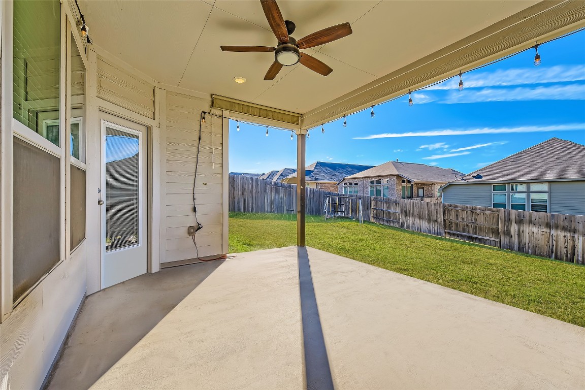 1075 Cherrystone Loop Buda, TX 78610 - Photo 25 of 28 a view of a backyard of a house