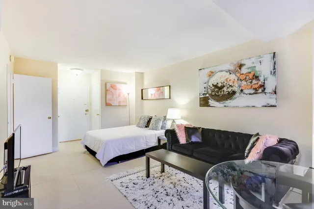 a living room with furniture and a couch