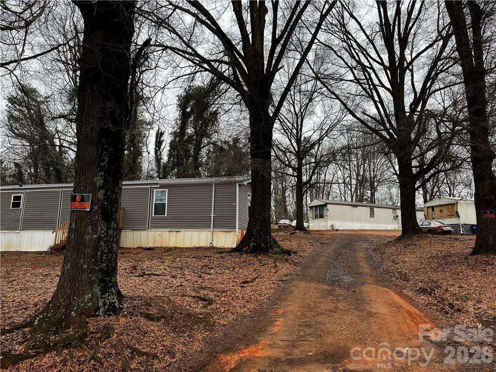 3680 Berry Road Connelly Springs, NC 28612 - Photo 3 of 3 a house view with a backyard space