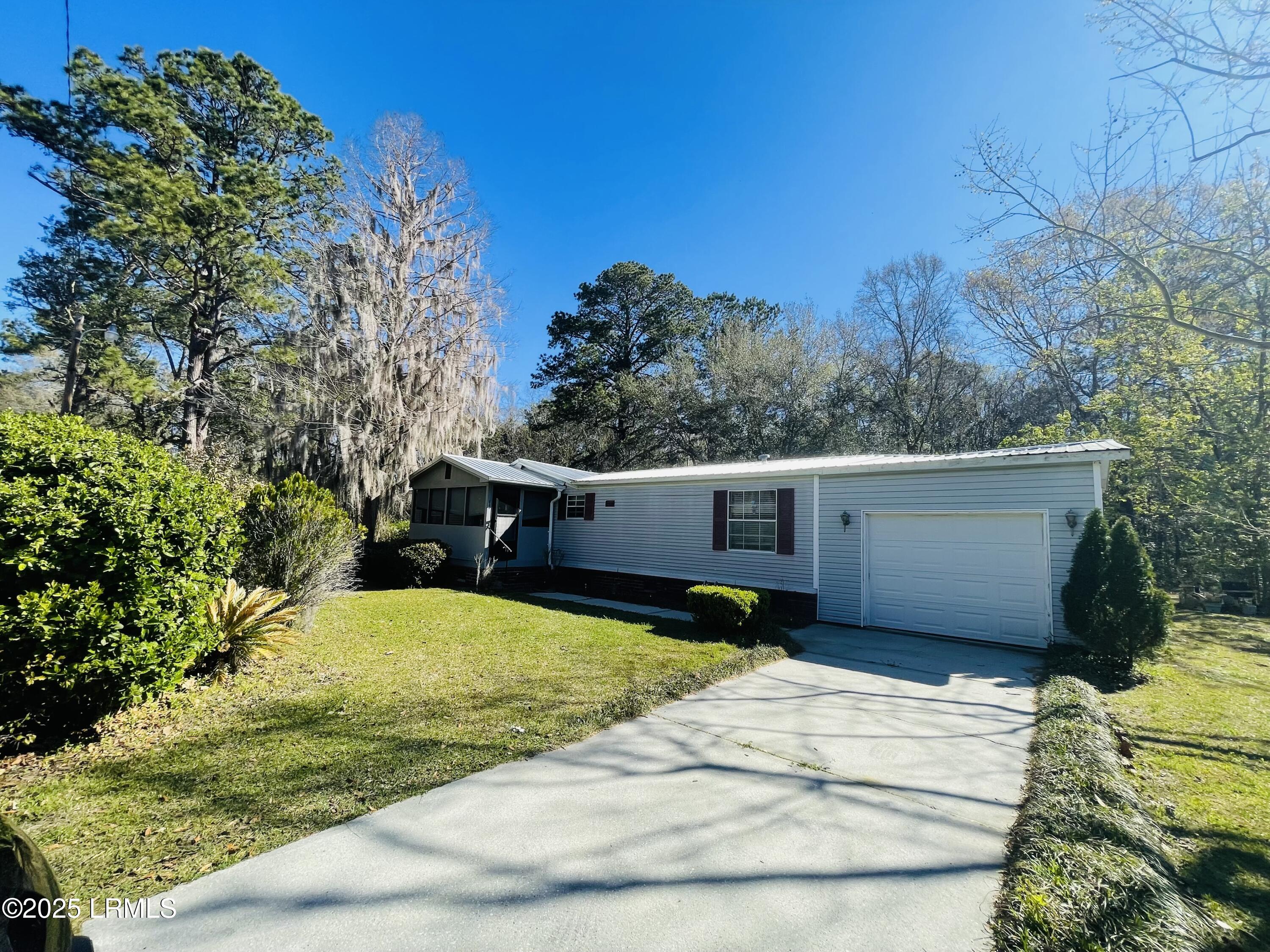 153 Middlefield Circle Seabrook, SC 29940 - Photo 2 of 13 IMG_5023