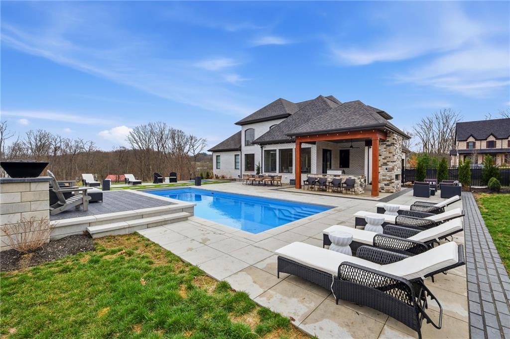 2002 Mallard Lane Baden, PA 15005 - Photo 42 of 50 a view of a house with swimming pool and a chairs