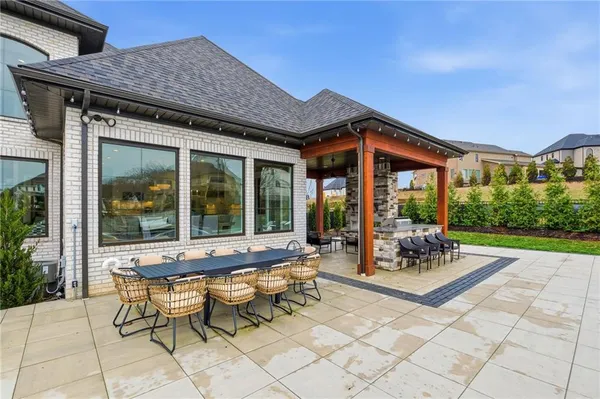 a view of a house with a small yard