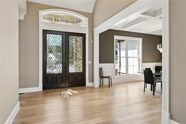 a view of a livingroom with furniture and a window